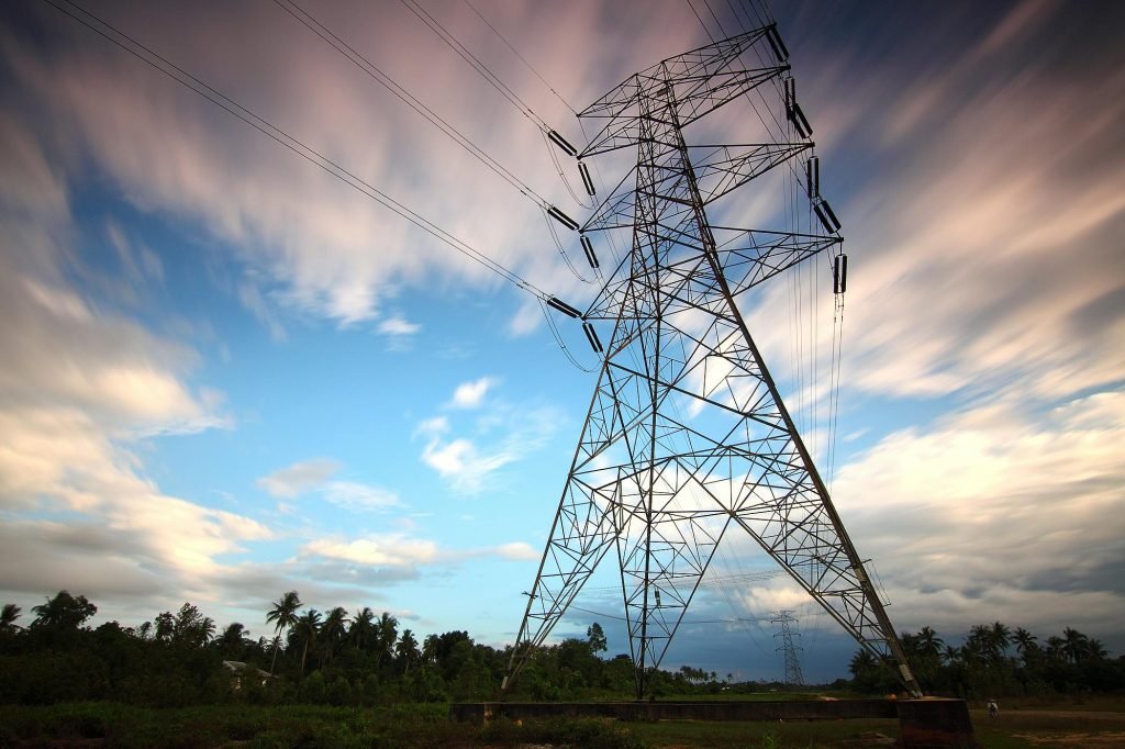 pexels-photo-157827-157827 Stunning view of a towering power line against a vibrant sky, showcasing energy infrastructure in nature.